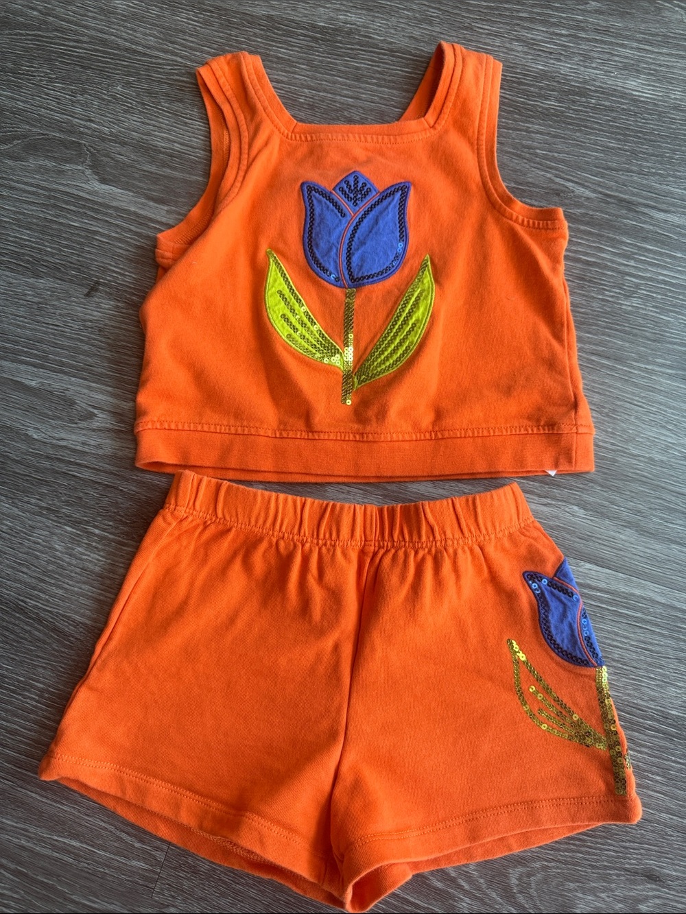 Dillards Kids Bright Orange Two-Piece Tank & Shorts Set with Blue Tulip Appliqué